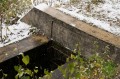 Konec kanálu v podobě vyustění do betonového potrubí u bývalé osady Sedlo 
